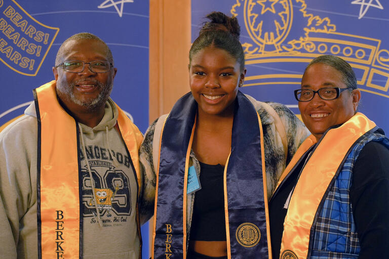Student and Families pose for a picture